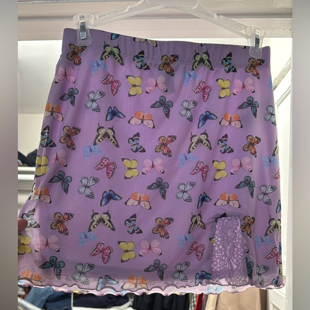 Purple butterfly mini skirt worn